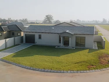 Completed estate home with garden